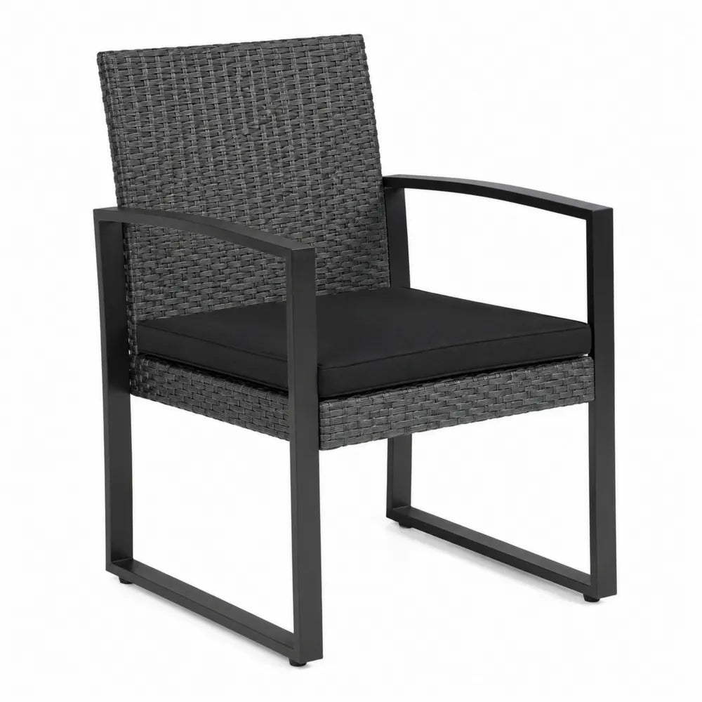 Sedia da esterno in metallo e rattan con cuscino nero